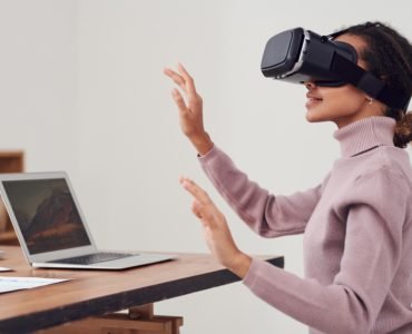 The person enjoying an event from her home using VR technology